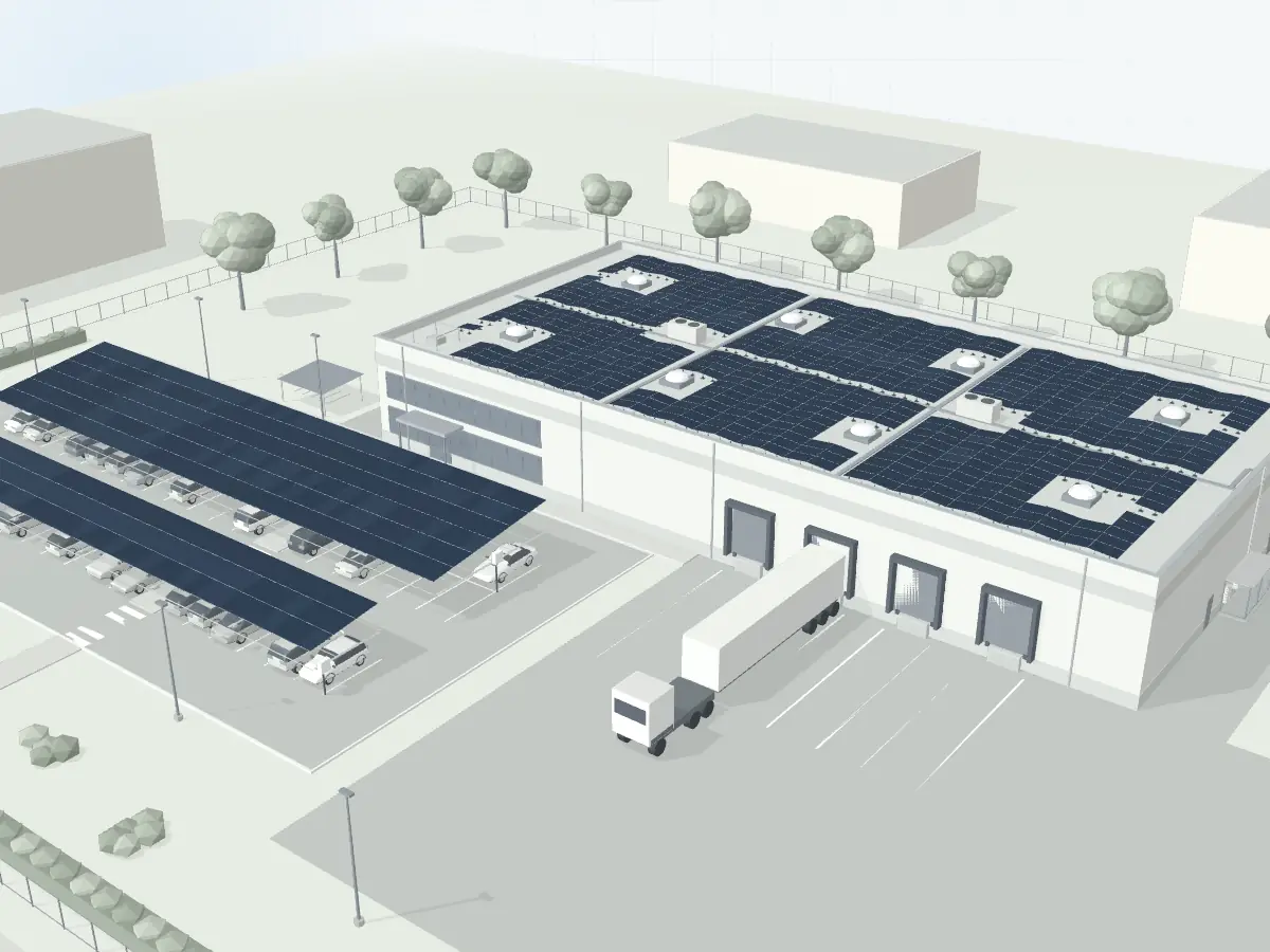 Modules posés en dômes est-ouest sur la toiture et deux ombrières de parking, double et simple.
